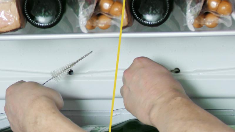 Abfluss mit der Bürste reinigen