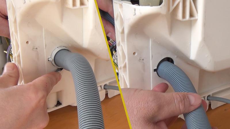 Durchführung des Ablaufschlauchs entriegeln Durchführung des Ablaufschlauchs entriegeln