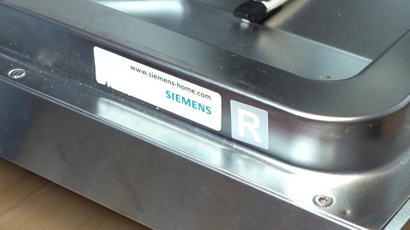 Reparaturaufkleber anbringen