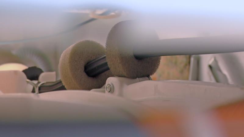 Schlauchschutz positionieren